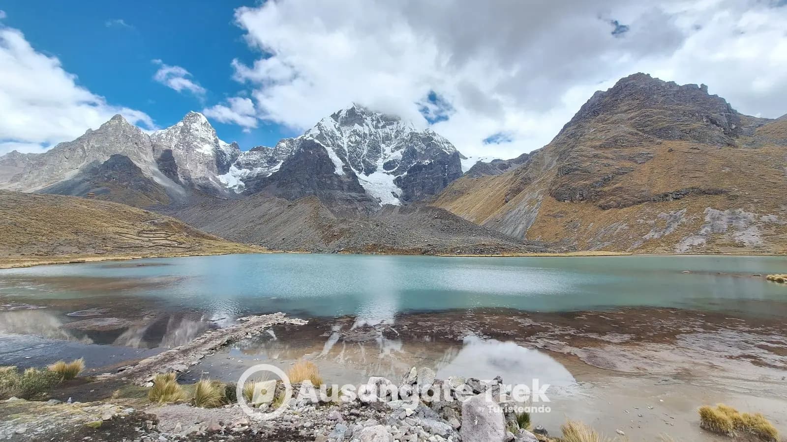 Anqas Qocha, the blue lake, below the Ausangate glacier on the 7 Lakes hike