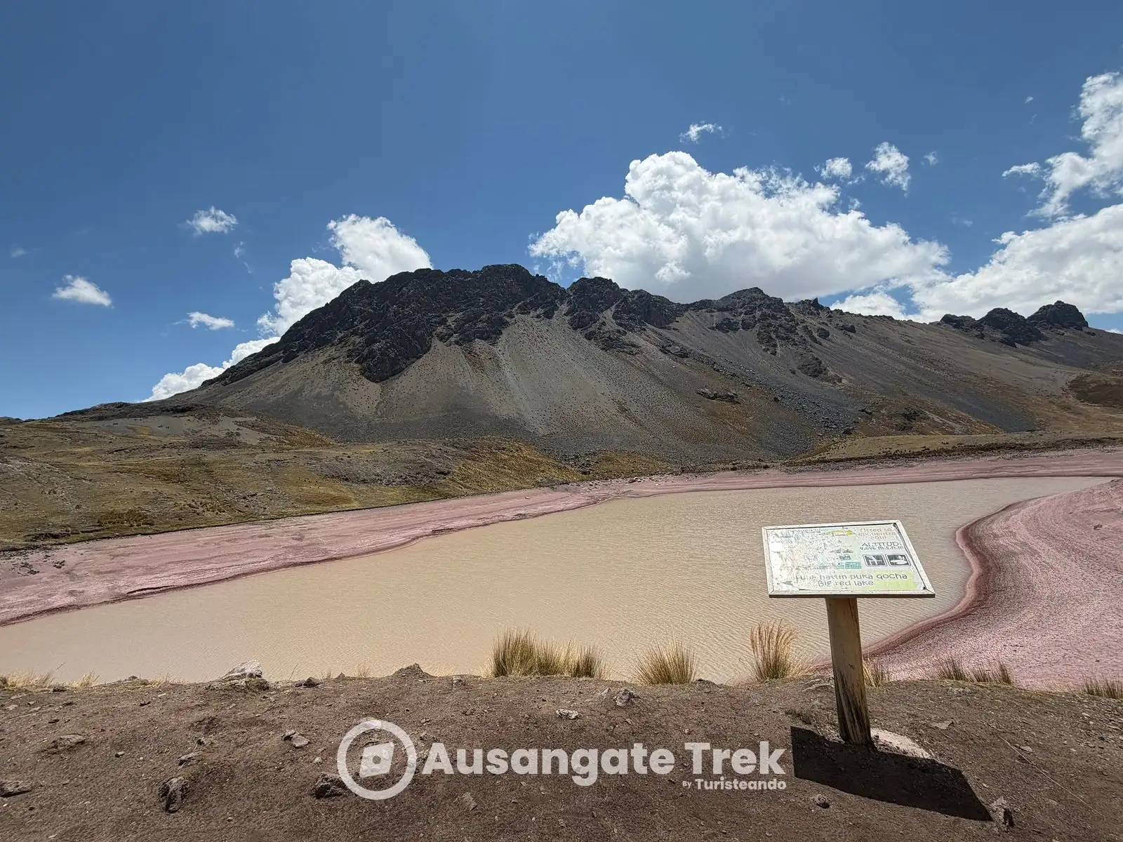 Hatun Puka Qocha, the big red lake, on the Ausangate 7 Lakes hike in Peru